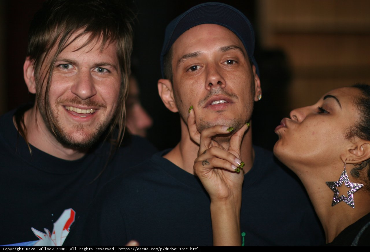 Blue Shirted Man in Artistic Company