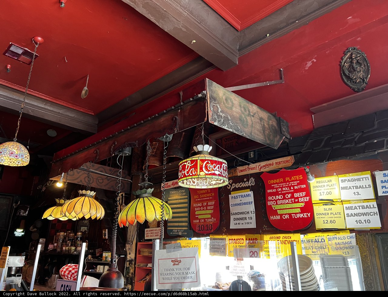 Red Ceiling and Signs at Popular Restaurant