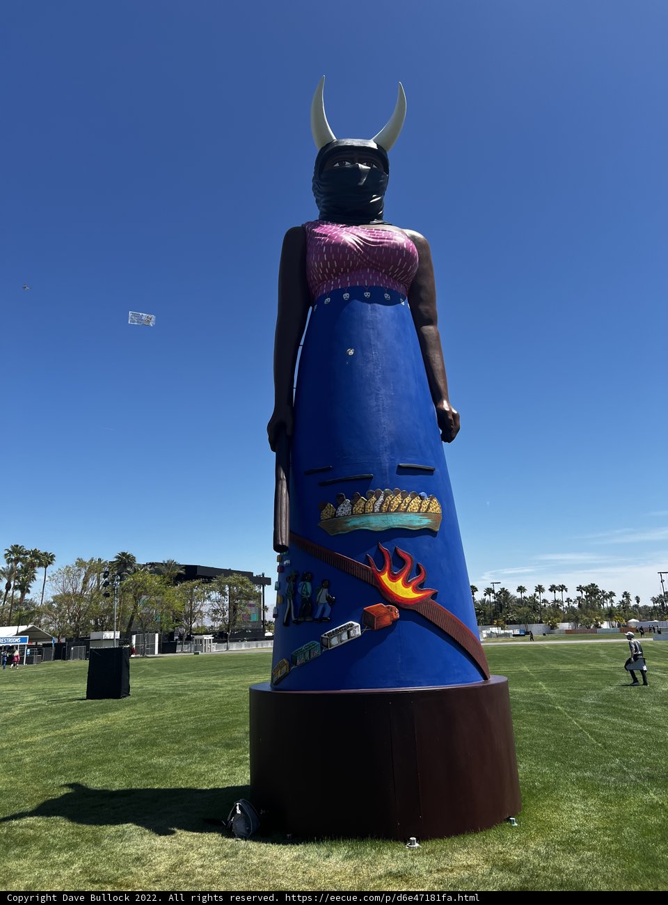 Horned Statue on Blue Barrel