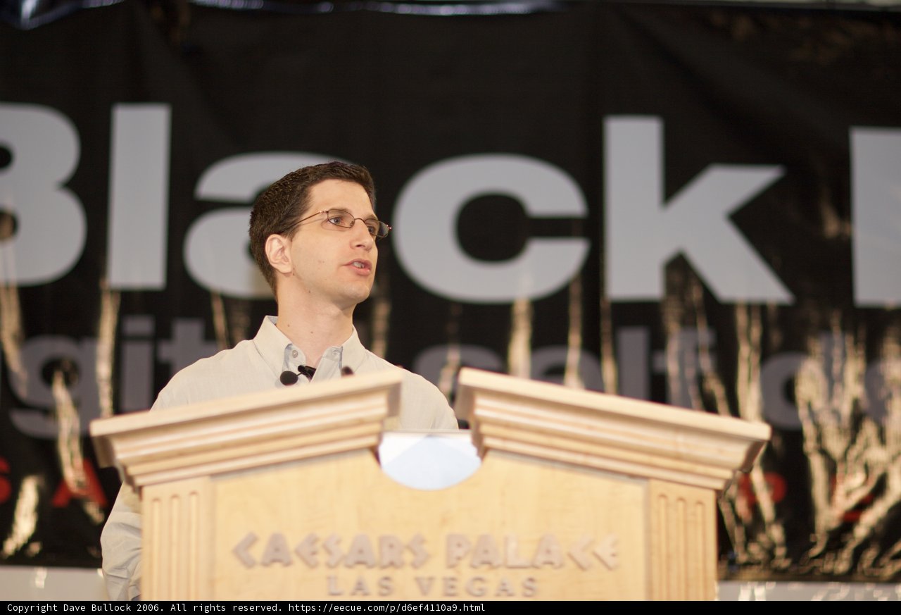 Jeff M Speaking at a Podium