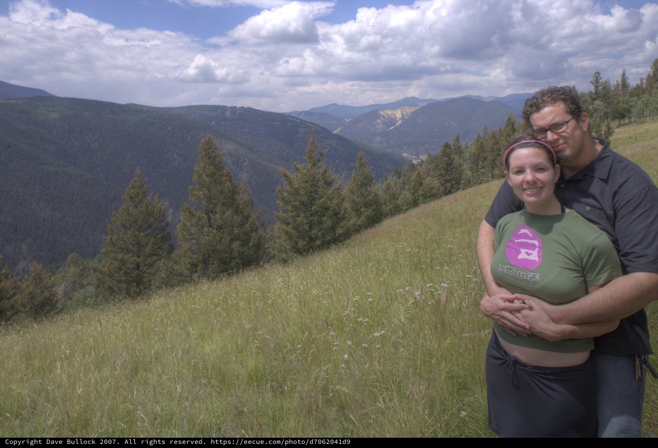 Couple Embracing on New Mexico Mountain Overlook