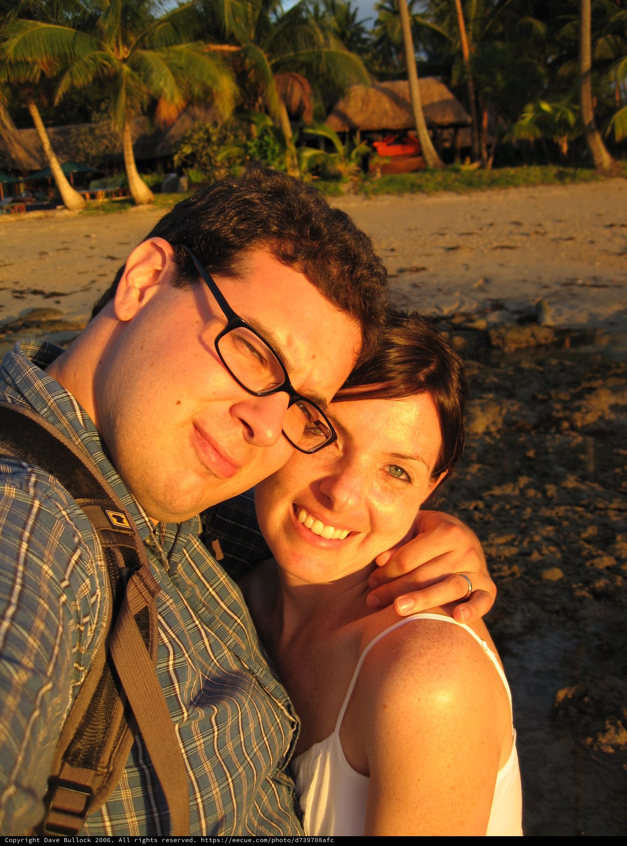 Couple Embracing at Golden Hour on Fiji Beach