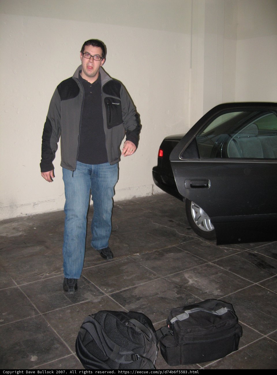 Garage Man with His Wheels
