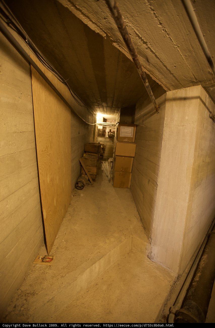 Boxes and a Door in the Building's Hallway