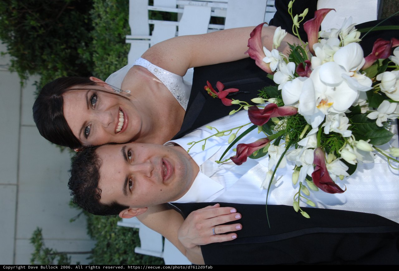Newlyweds Share a Joyful Moment on Their Wedding Day