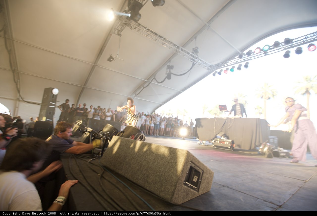 Man on stage with a microphone at Coachella 2008