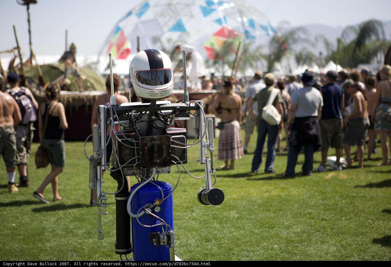 Helmeted Robot in the Coachella Crowd