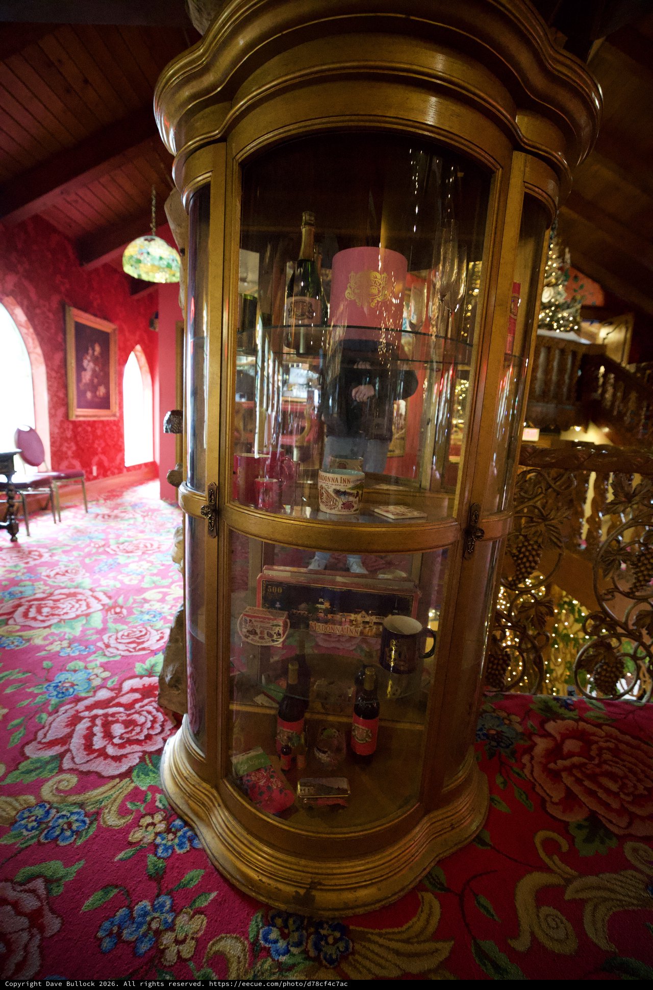 Ornate Display Cabinet in Victorian-Style Parlor