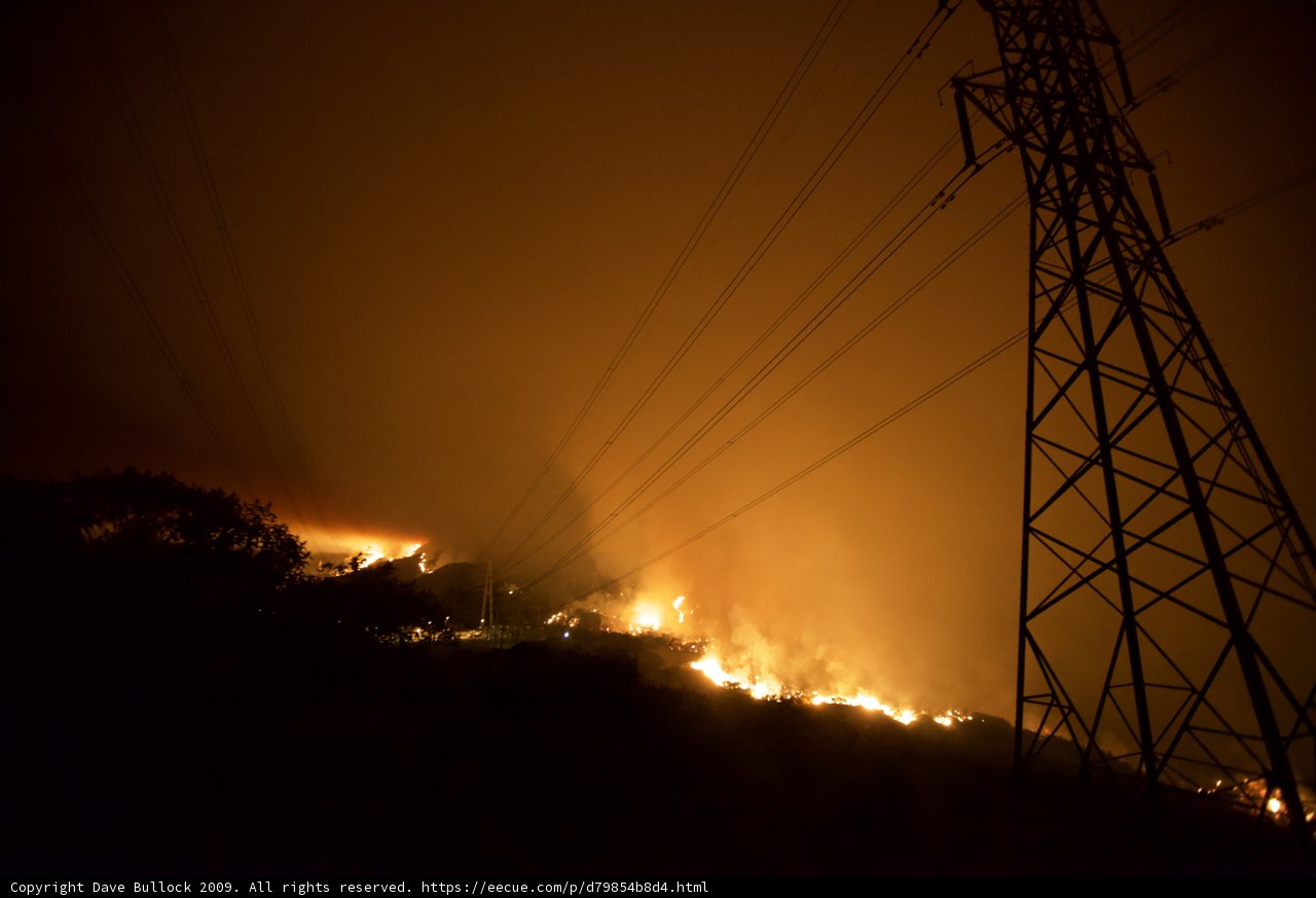 Station Fire Engulfs Power Lines and Trees