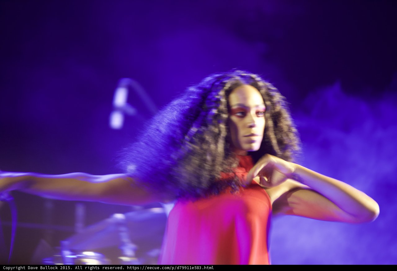 Solange Arms Spread Hands Near Chest Dance Pose Purple