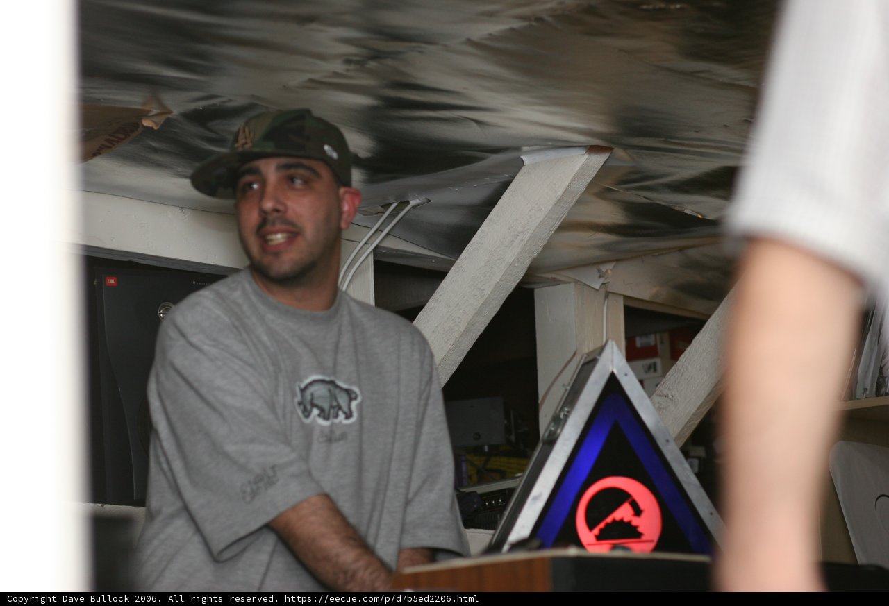 Eric S Posing with Plywood Triangle