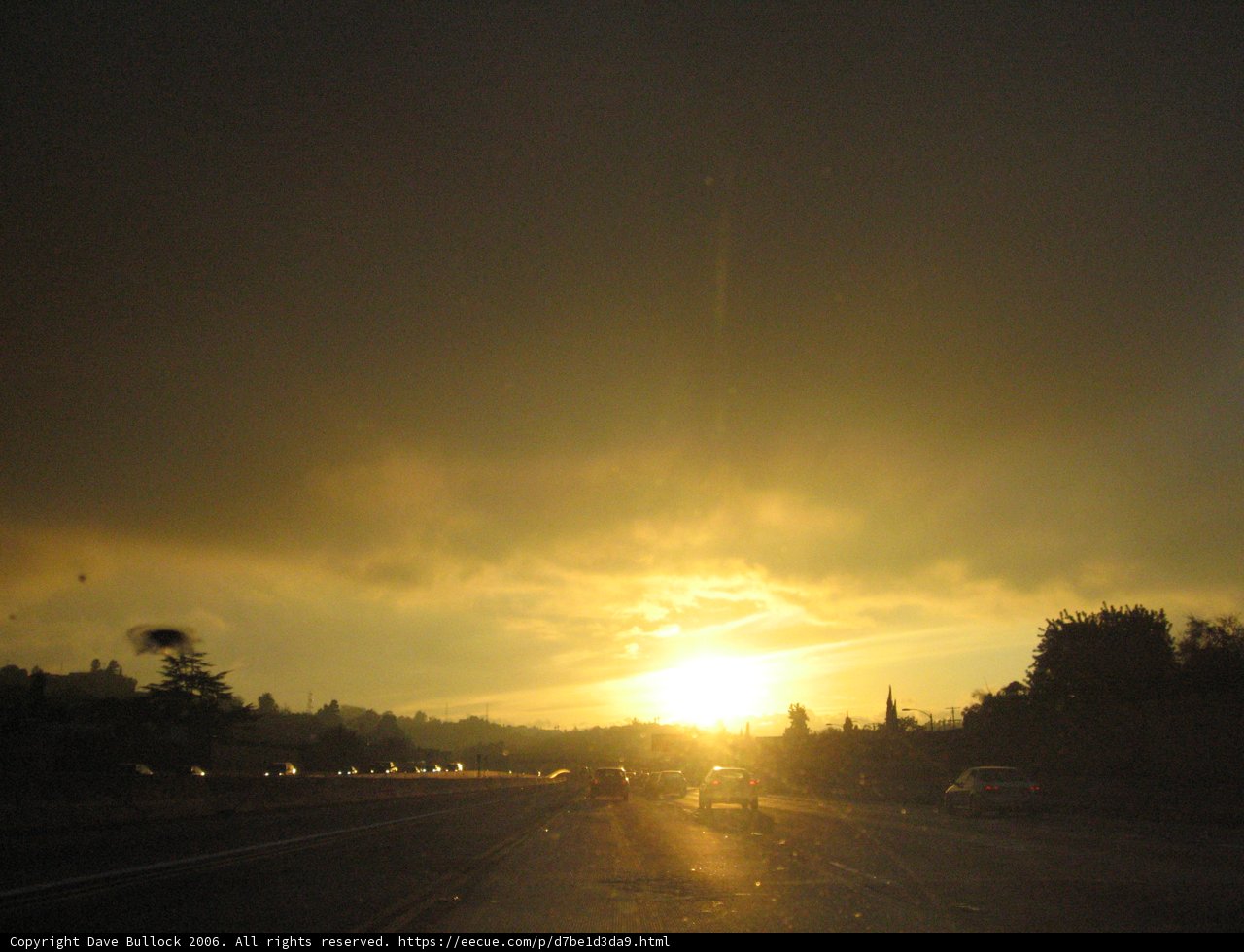Flare and Light at Sunset on the Highway