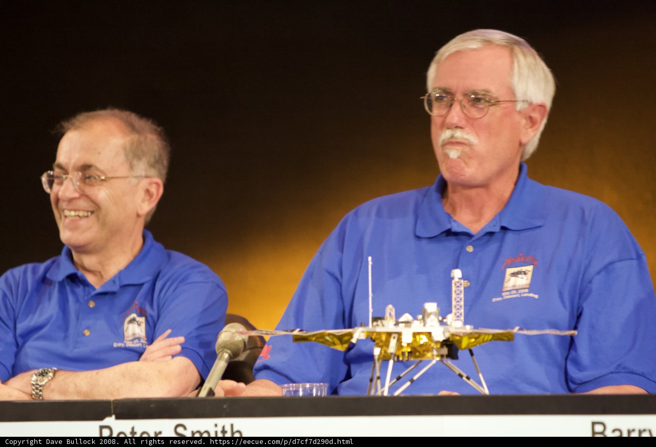 Two Men in Blue Shirts at Phoenix Landing Press Conference