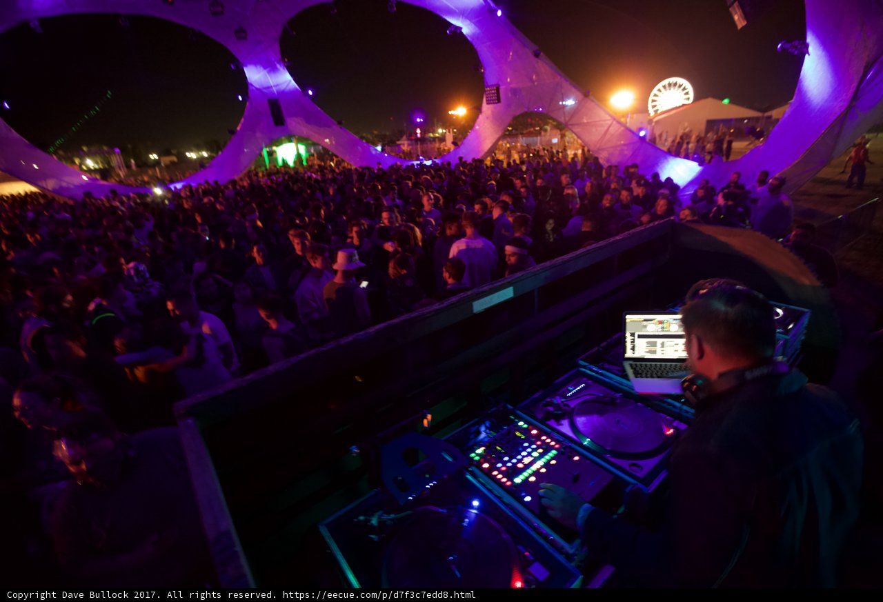 Nightclub DJ Lighting Up the Stage at Coachella
