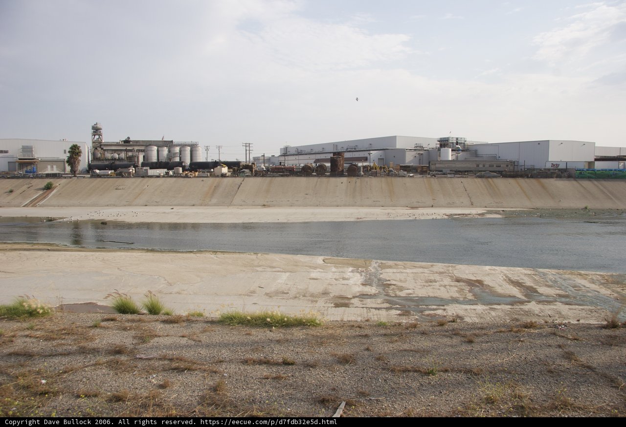 Serene River Flowing by a Majestic Dam