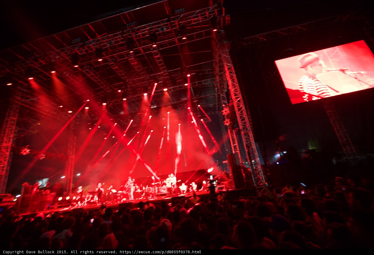 Belle and Sebastian Wide Stage Red Lighting Video Screen Stuart Murdoch Spotlight Beams Crowd
