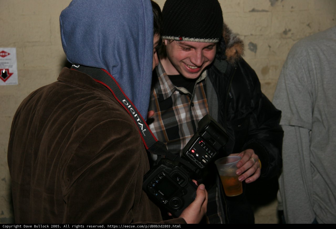 The Photographer in the Hoodie