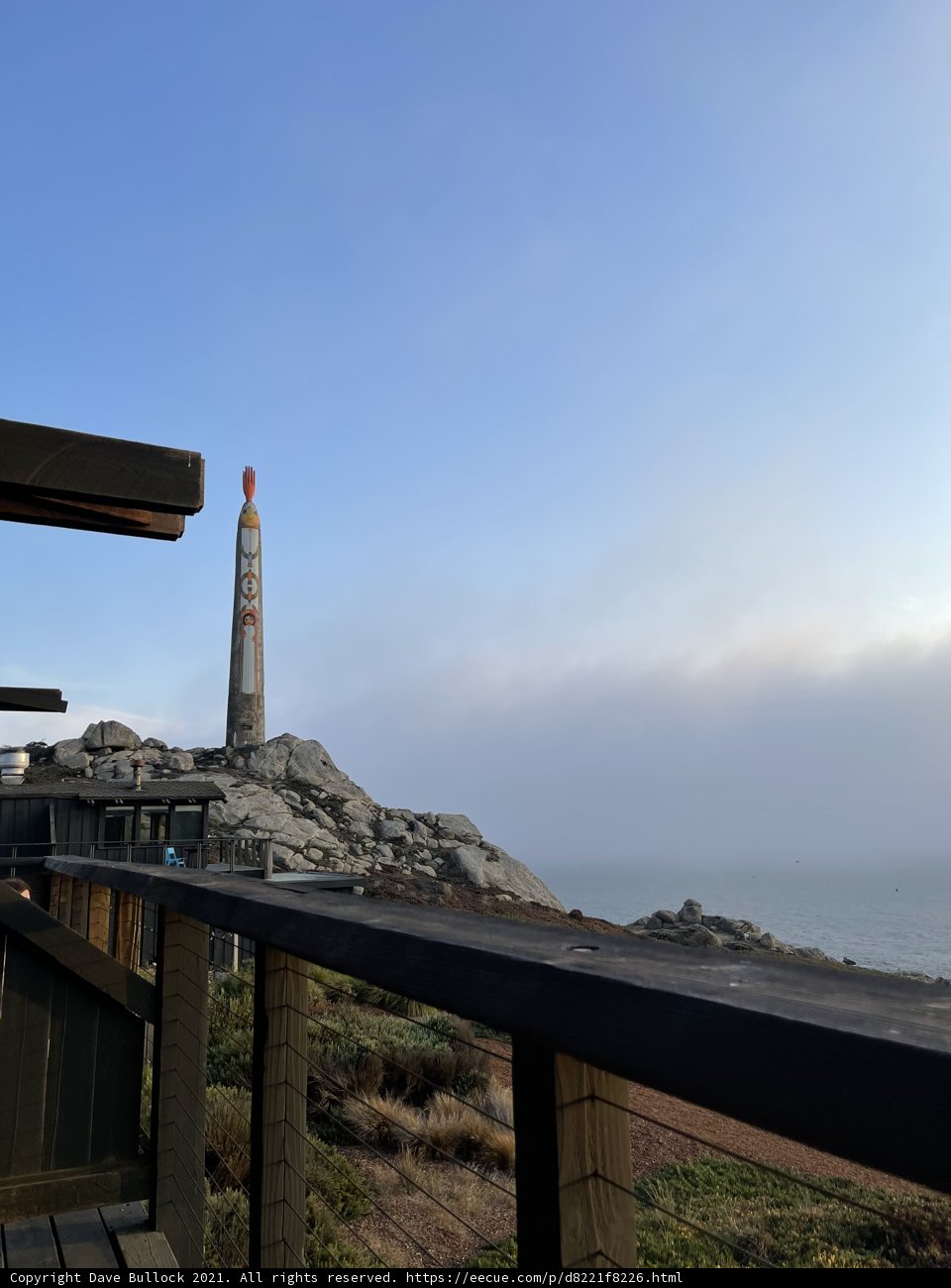 Foggy View of a Lighthouse by the Ocean