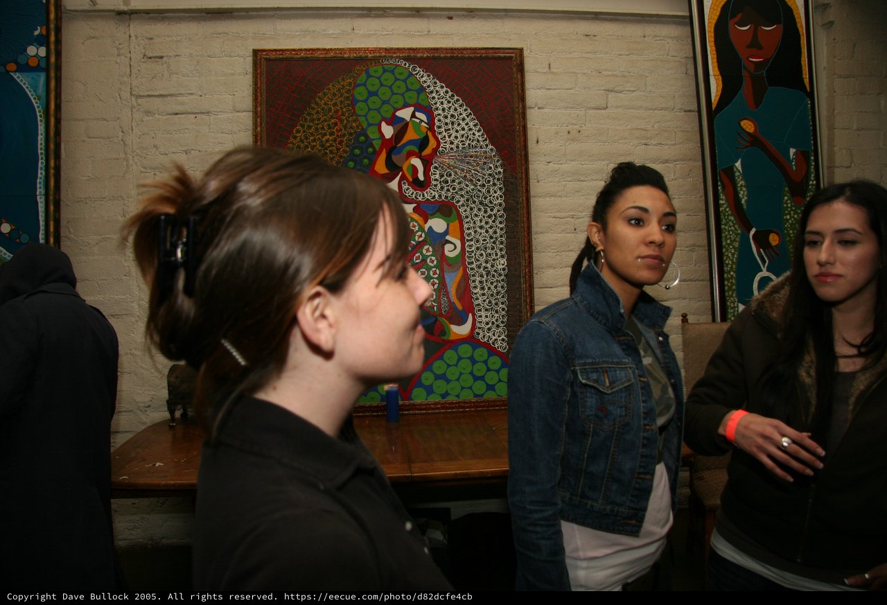 Art Gallery Evening With Three Women Amid Vibrant Paintings
