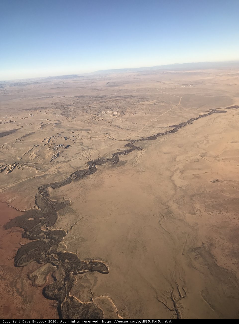Serene Desert and Flowing River