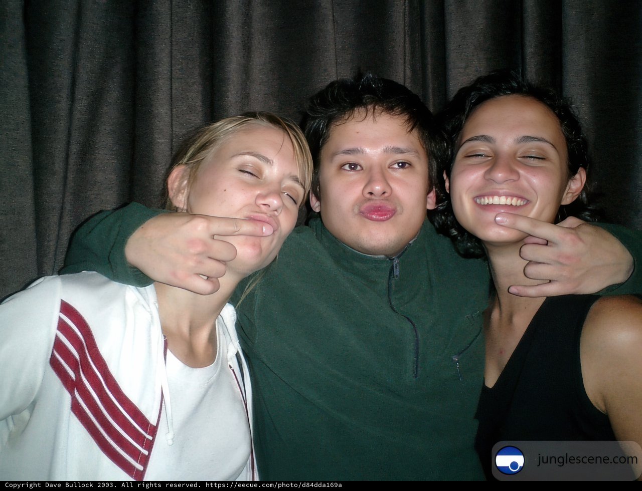 Three Friends Captured In A Joyful Moment