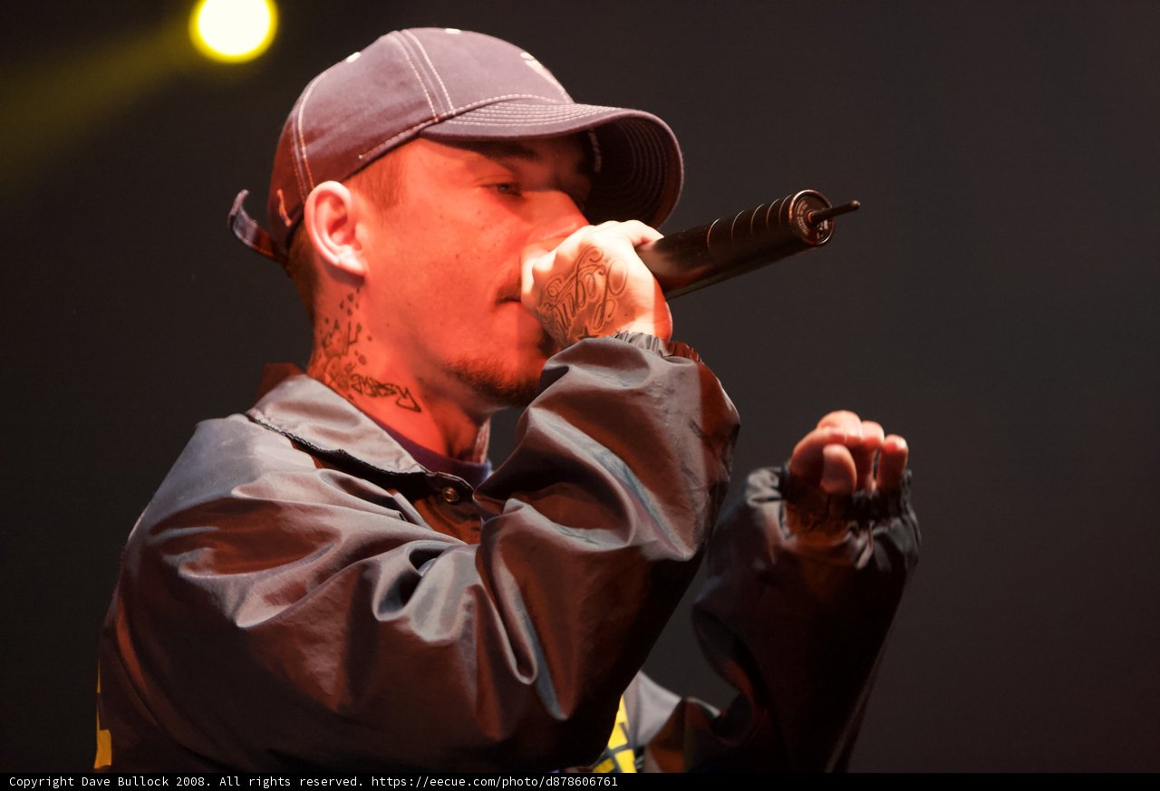 Entertainer Rocks Coachella Stage with Baseball Cap on
