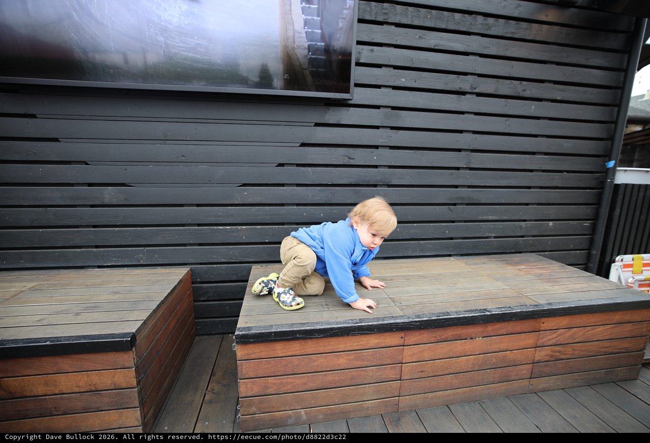 Toddler Climbing Modern Wooden Deck Stairs
