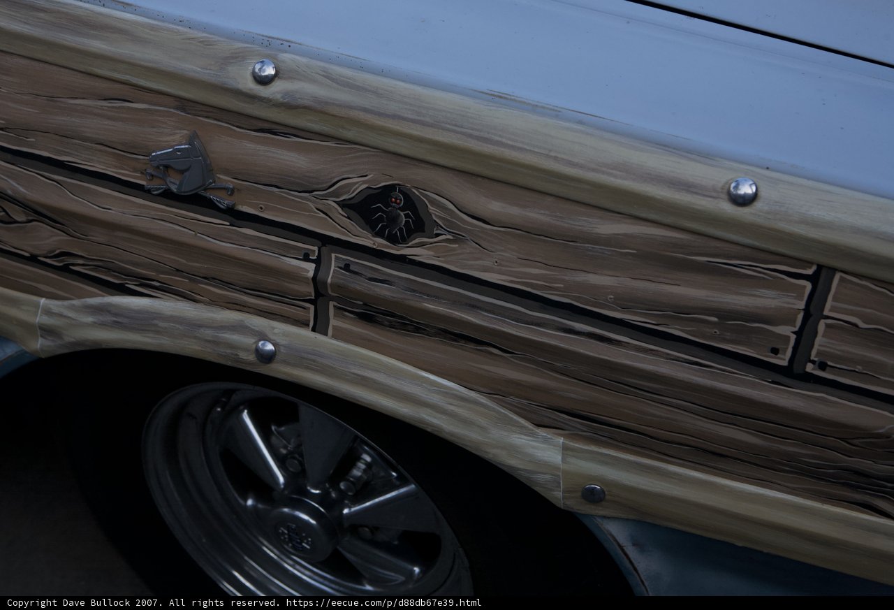 A Vintage Car with Wood Paneling