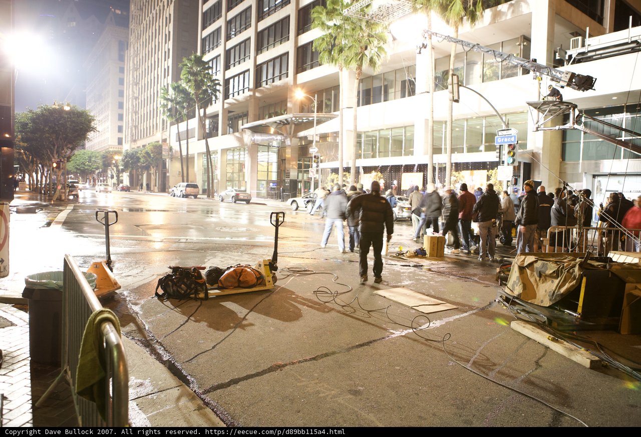 Night Strollers on Urban Sidewalk