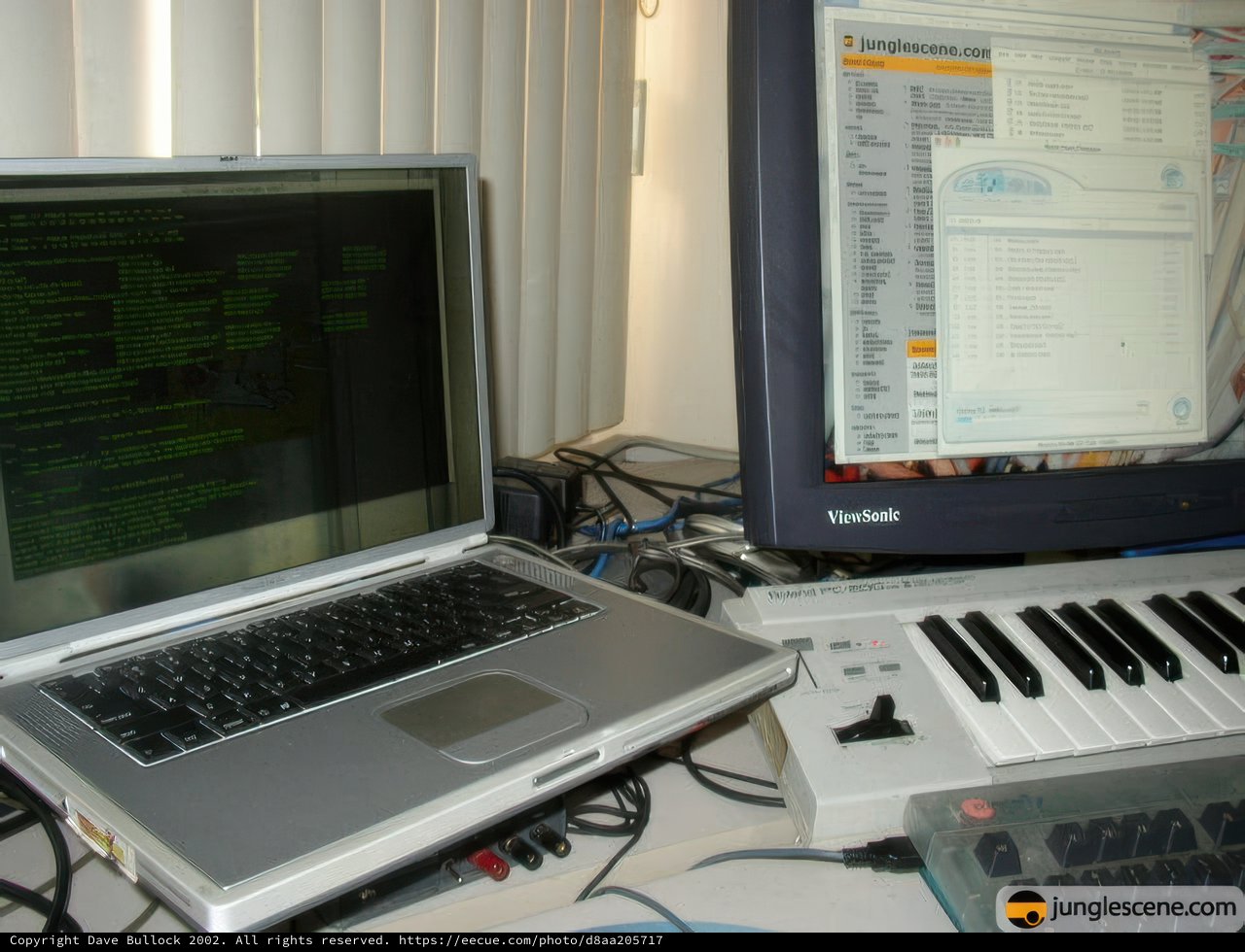 Laptop and Keyboard on Desk