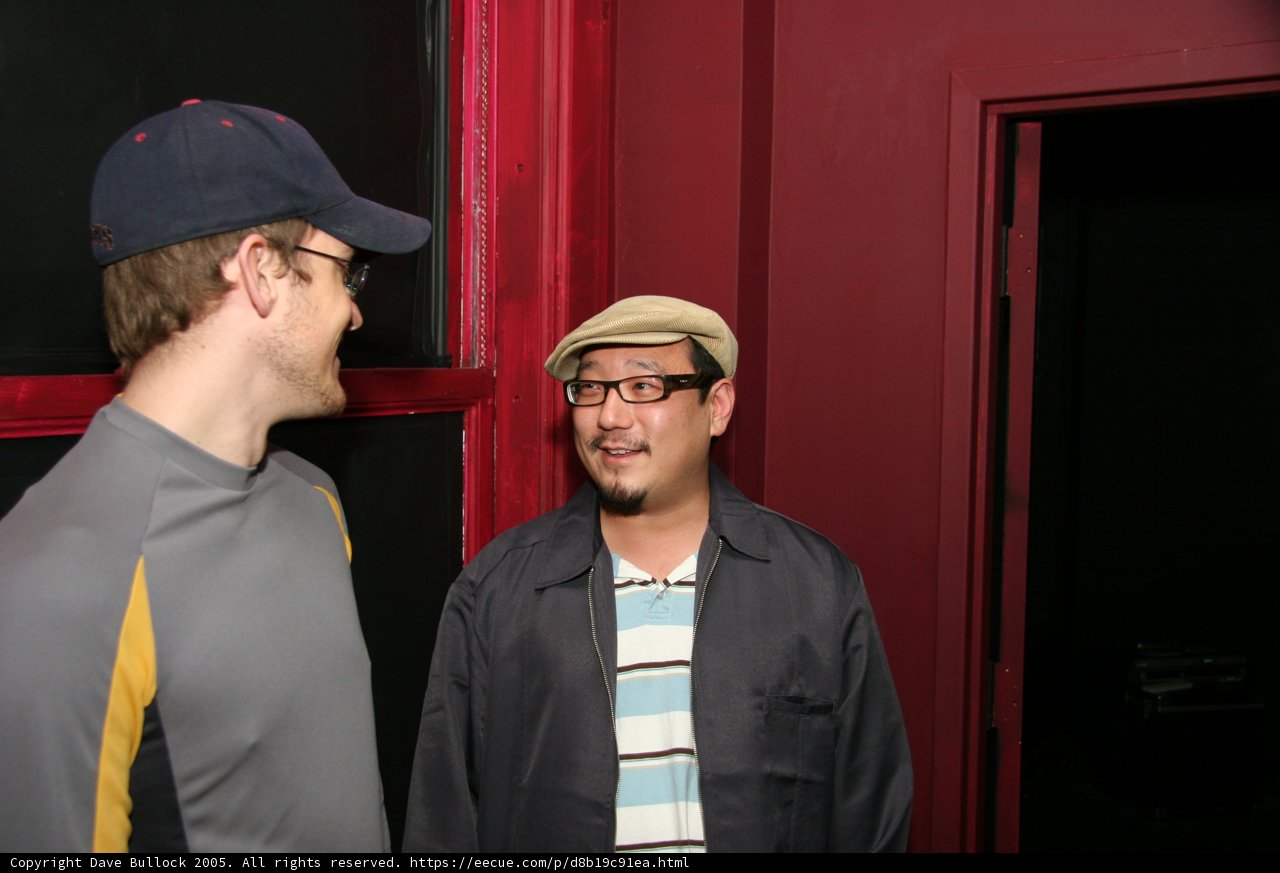 Two Men Discussing the Game