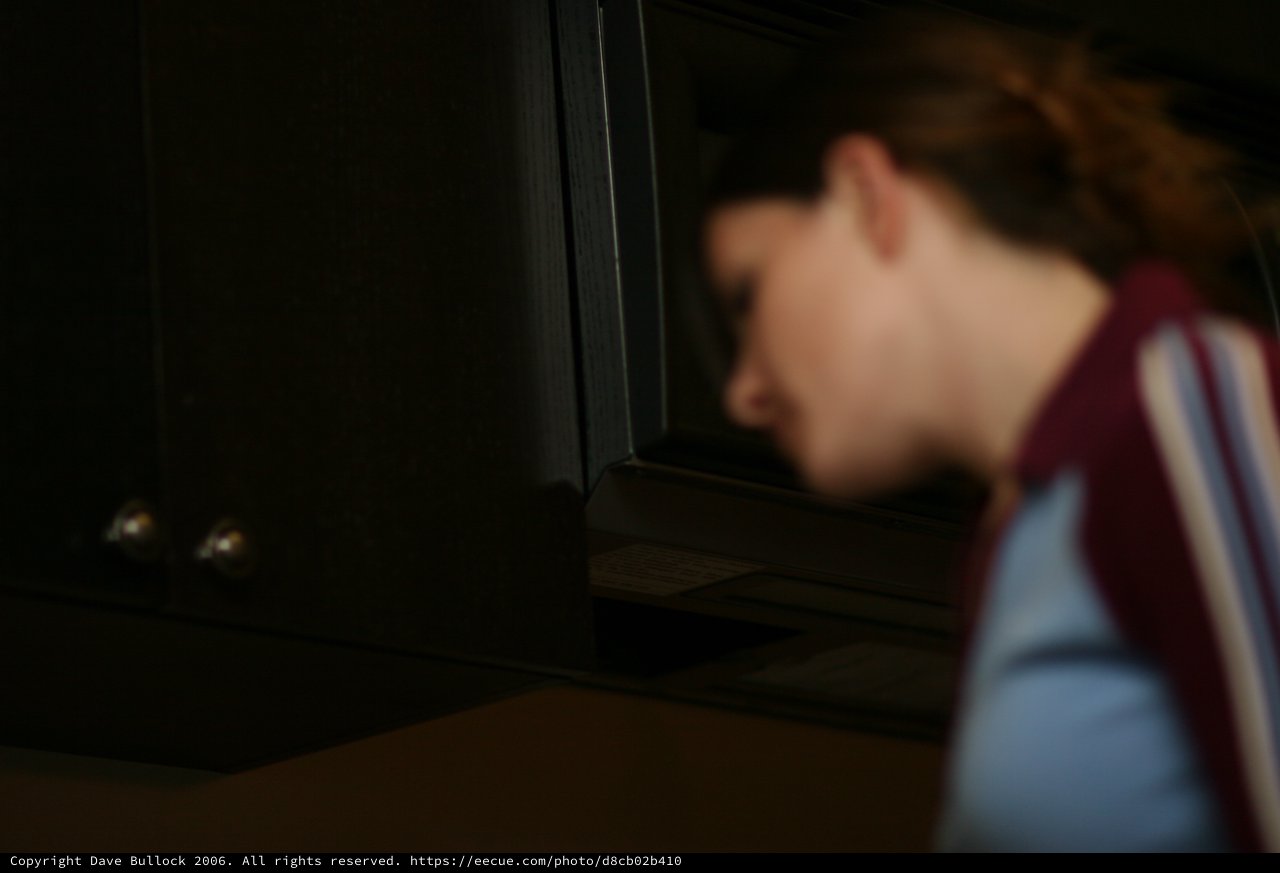Blurred Profile in Dim Kitchen Light