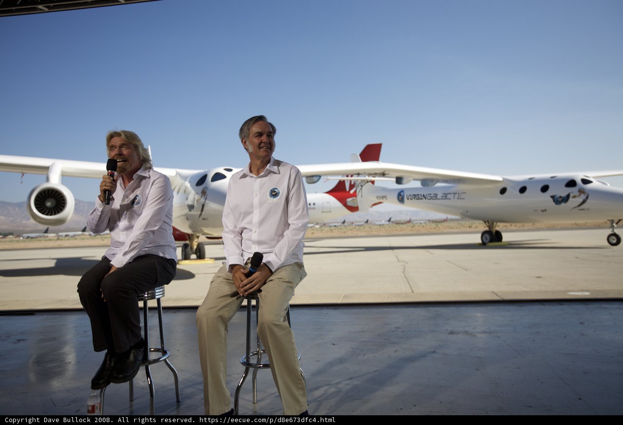 Aviation Titans Pose in Front of White Knight Two