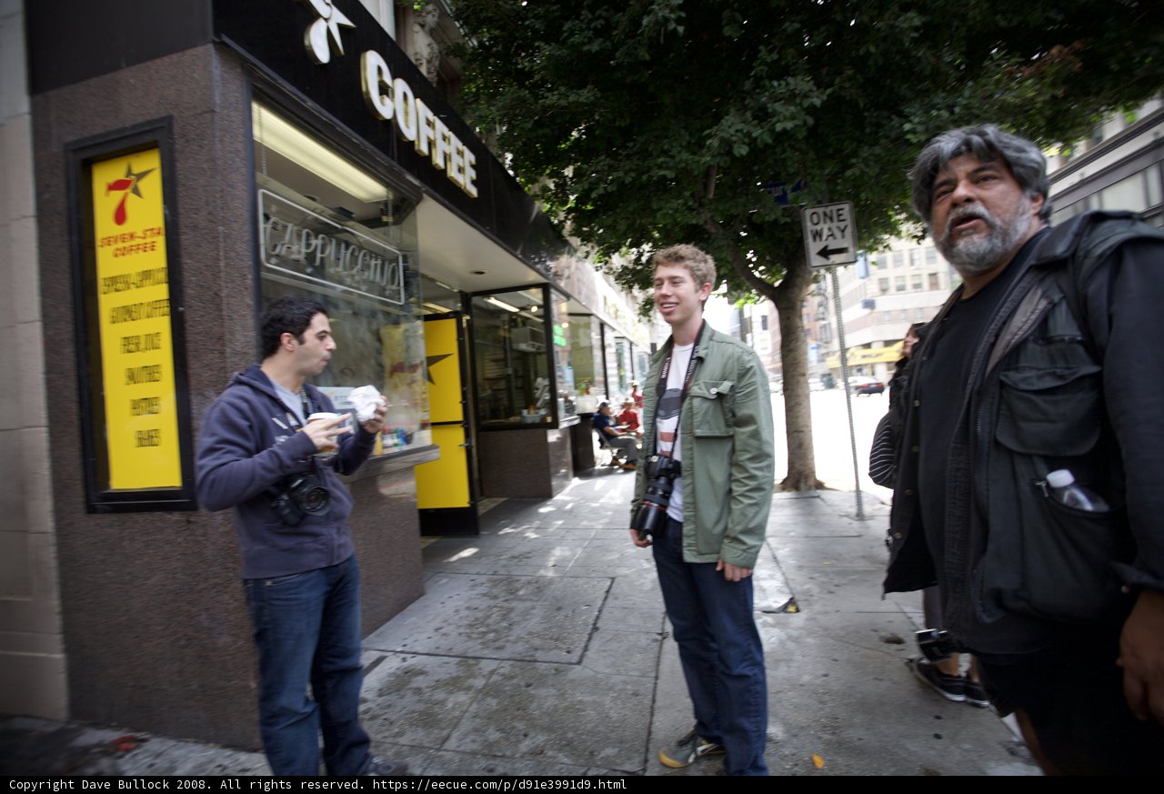 Three Men on the Urban Sidewalk