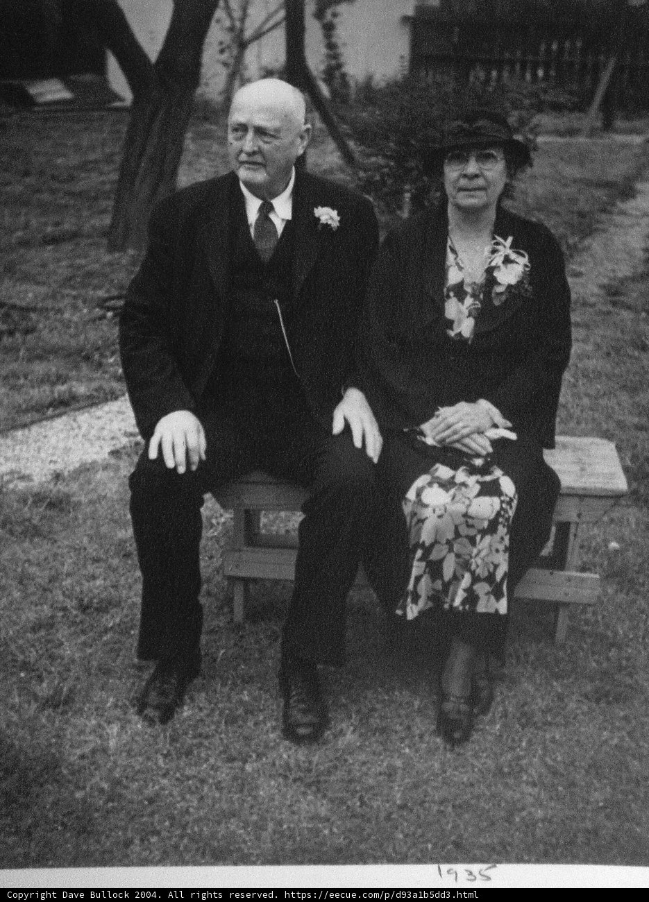A formal couple enjoying the outdoors