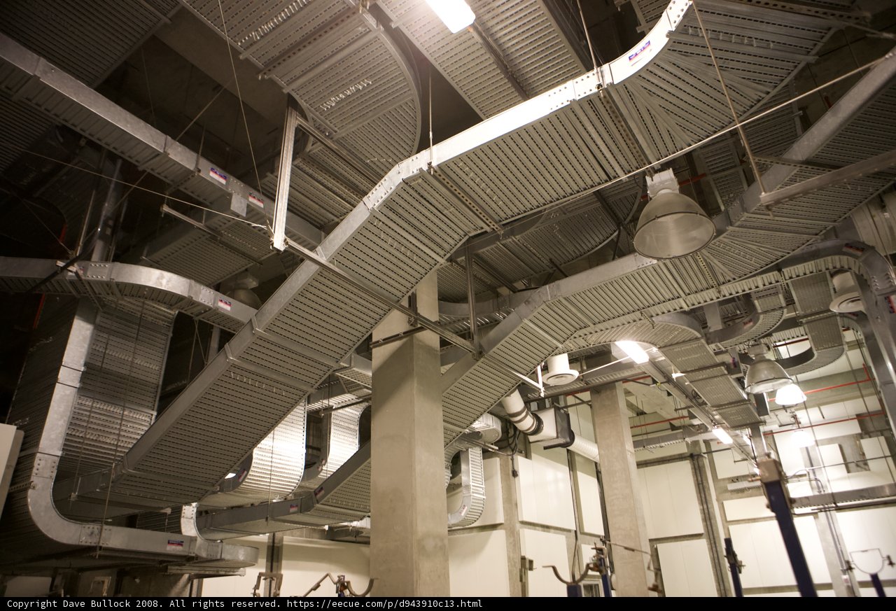 Pipes and Handrails in a Large Industrial Room
