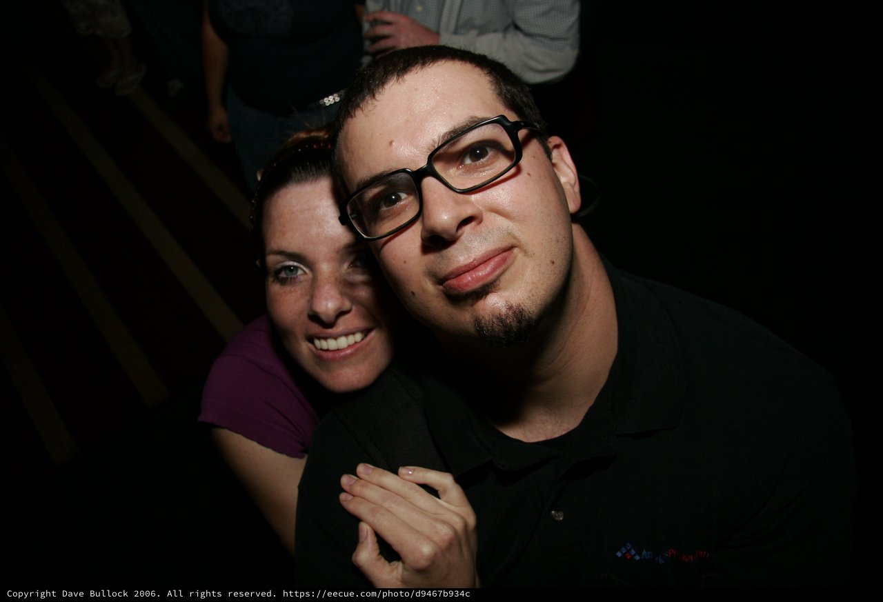 Couple Poses Together at Late Night Event