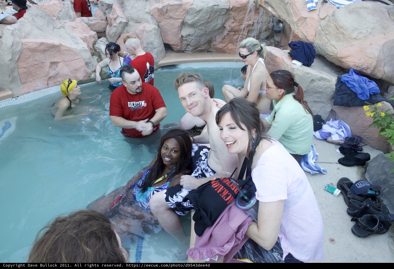 Friends Socializing at Pool Party During DEF CON