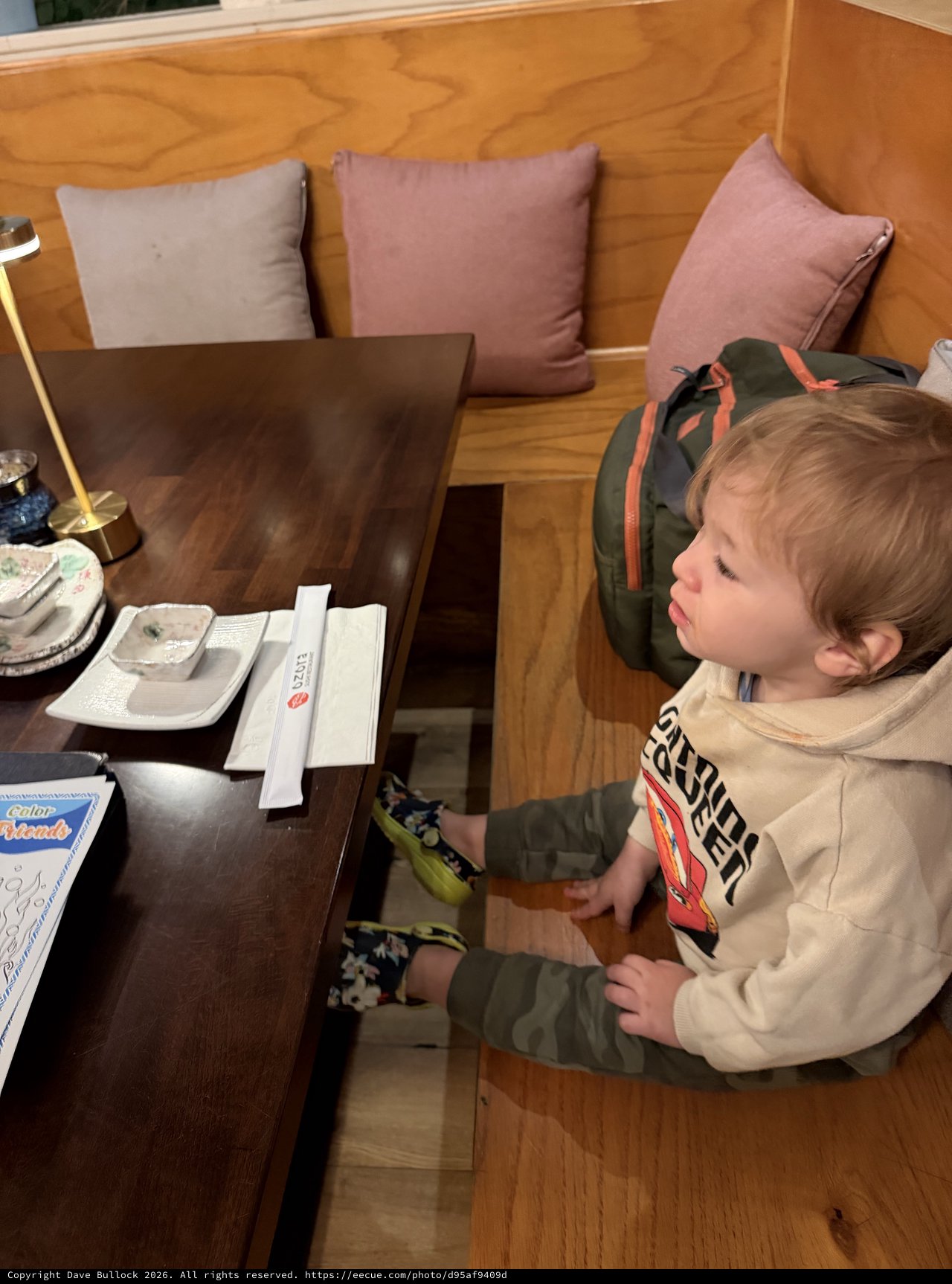 Young Child at Japanese Restaurant Table