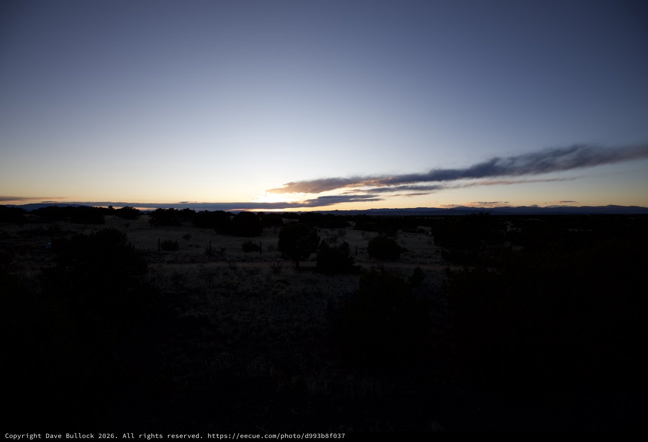 Desert Twilight Under Dramatic Cloud Formation