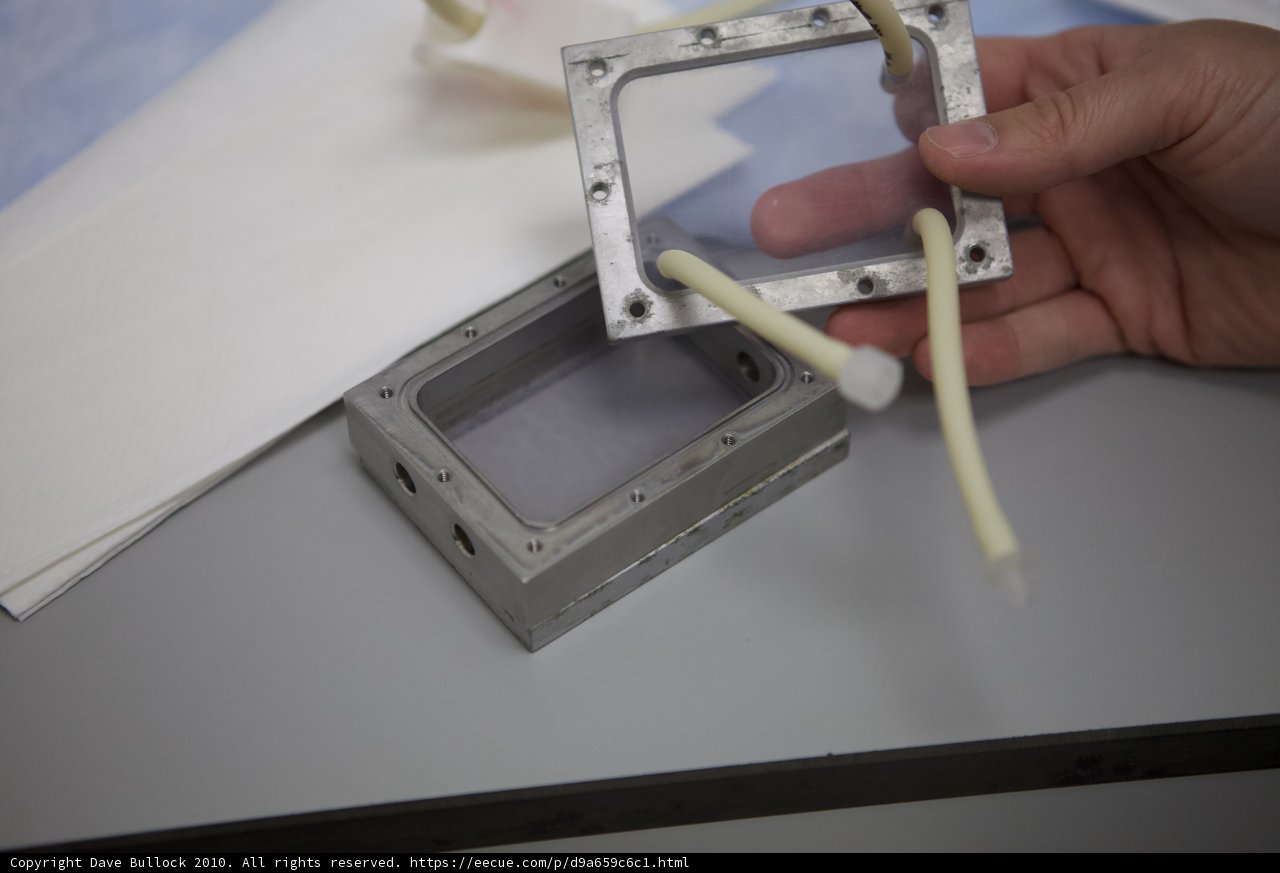 Holding a small metal box