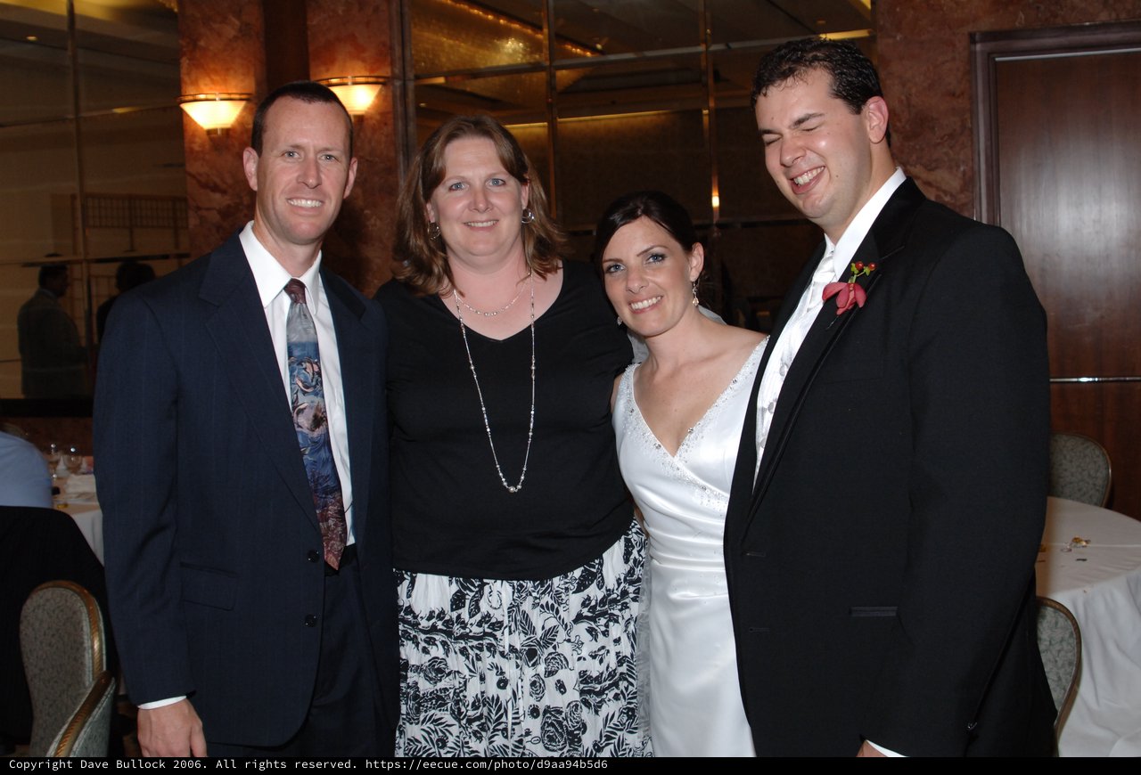 Joyful Wedding Reception Celebration with Four Guests