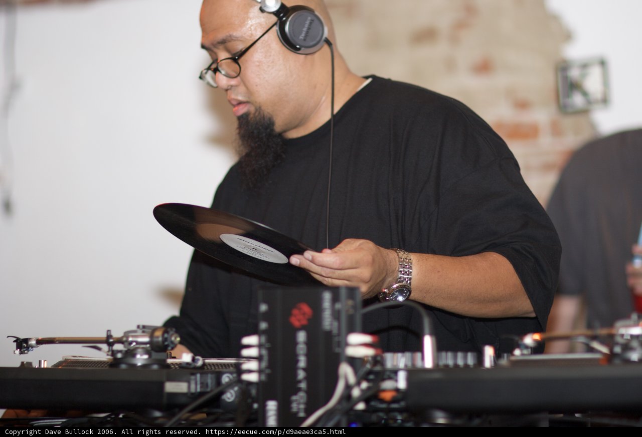 DJ Rhettmatic spinning on the turntables