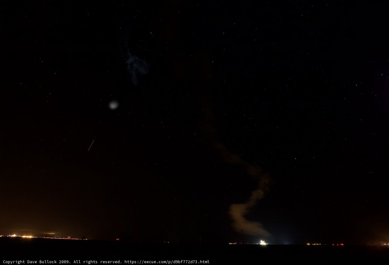Rocket Blazes Through Starry Night Sky