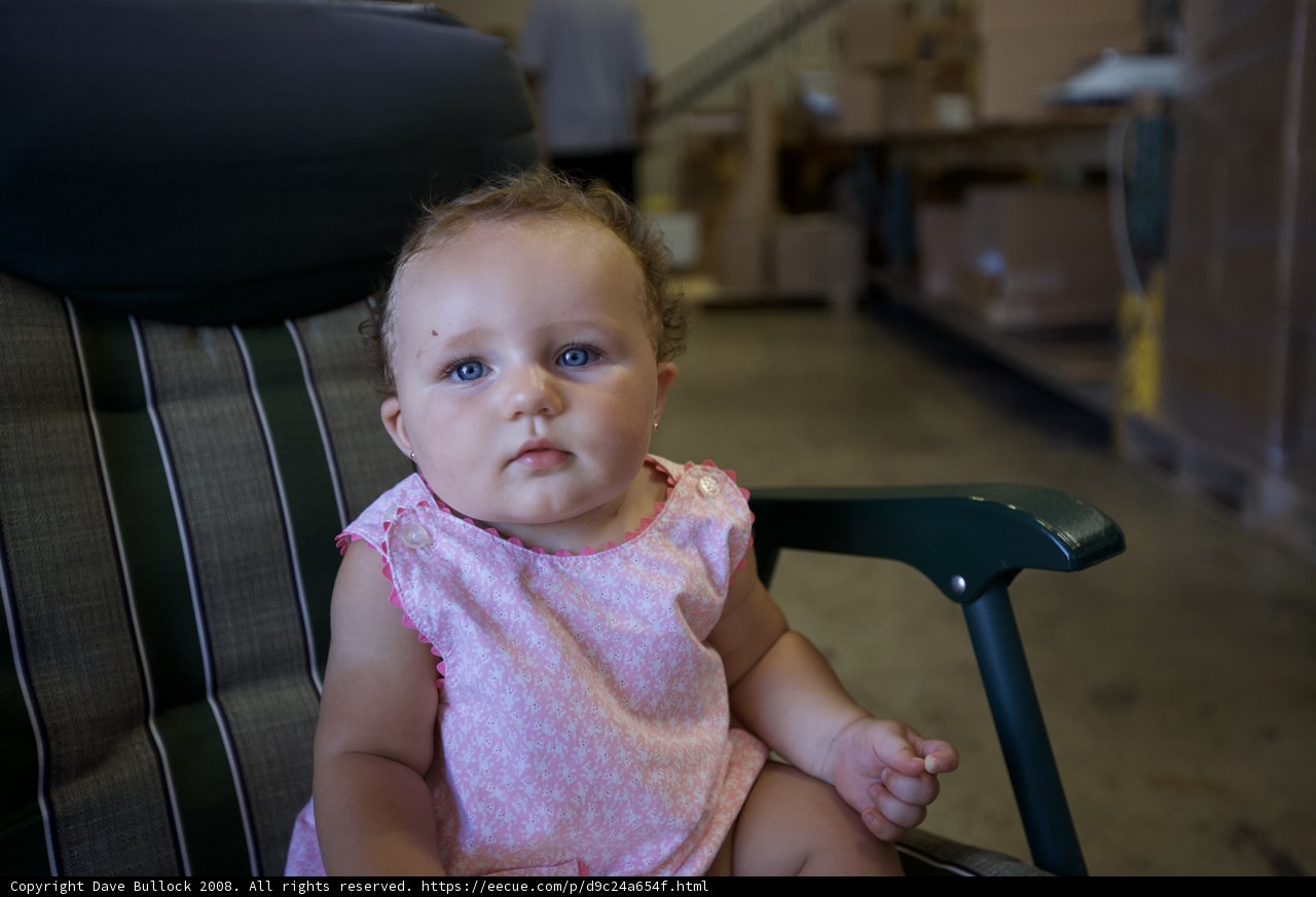 Baby in a Warehouse Chair