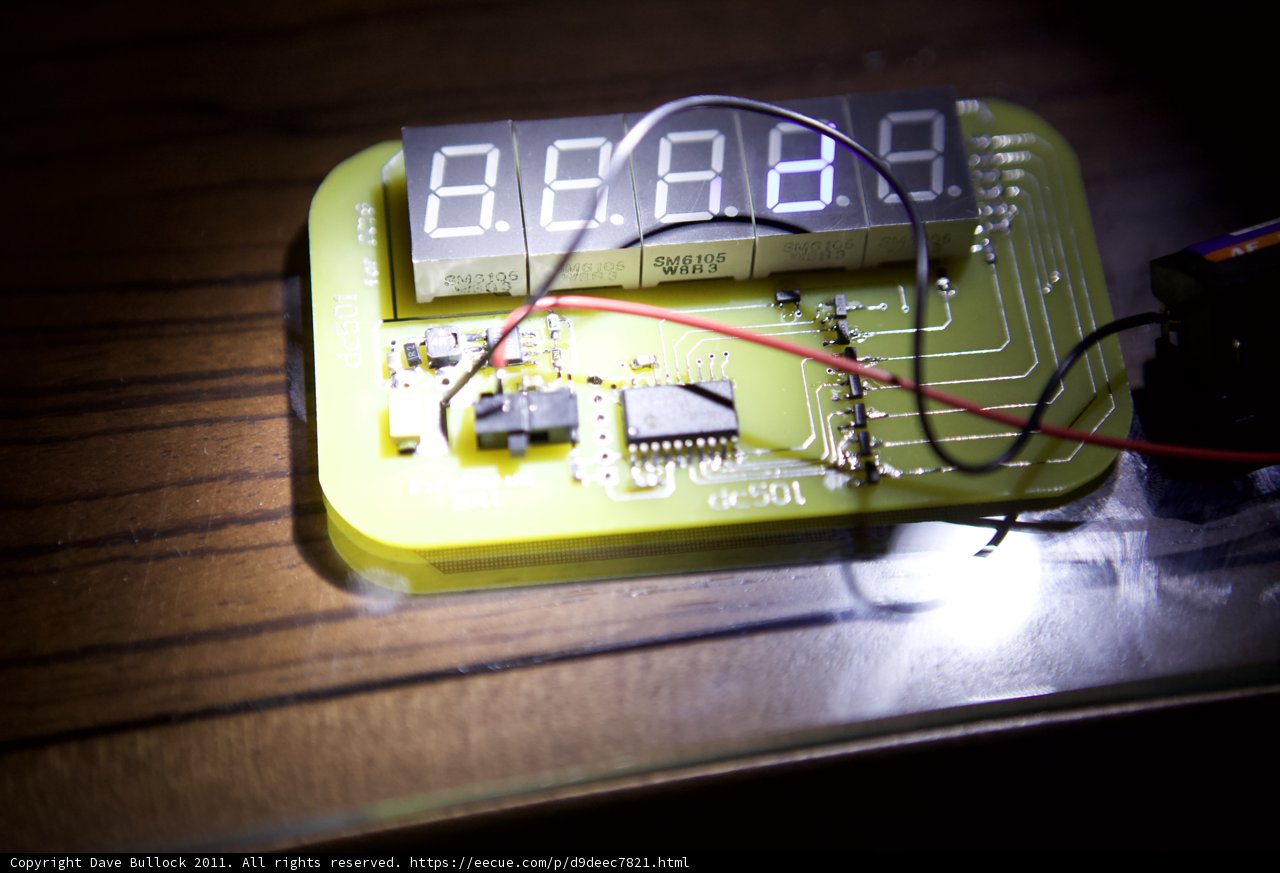 Digital Clock on Wooden Table