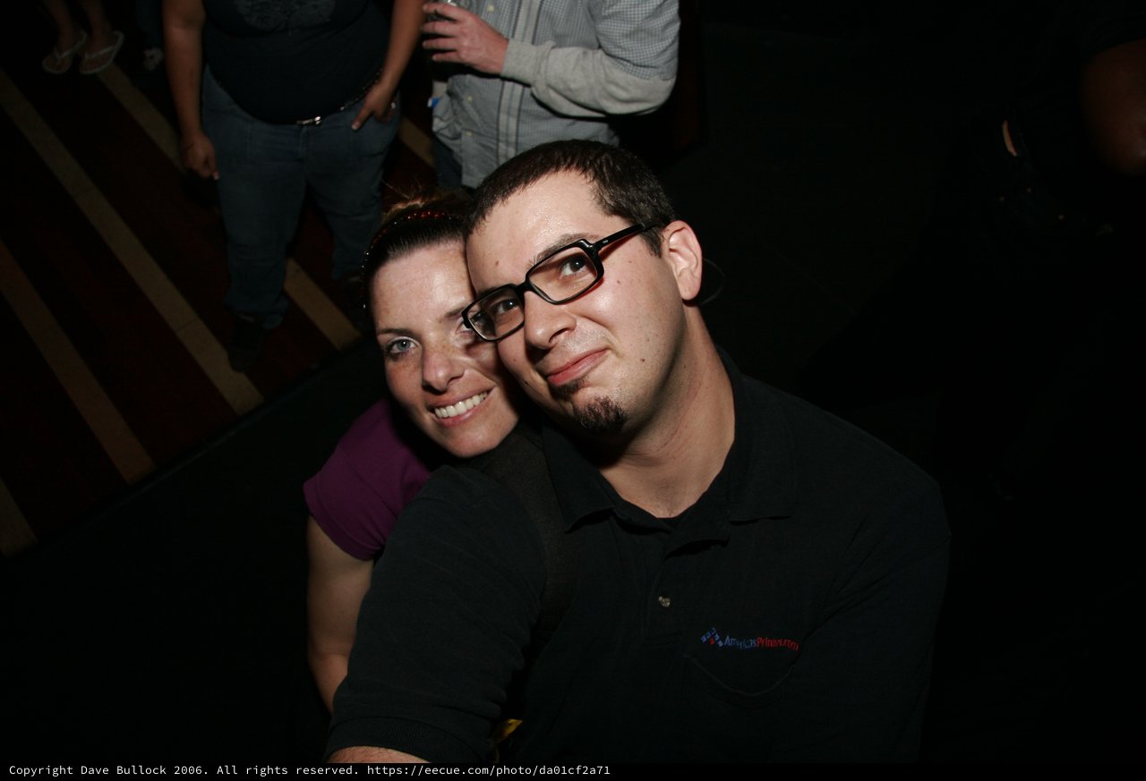 Couple Poses Together at Evening Social Event