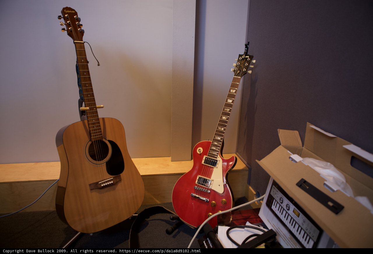 Two Guitars Ready to Play