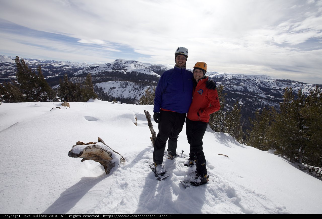 Summit Celebration Atop Snow-Covered Sierra Nevada Peak