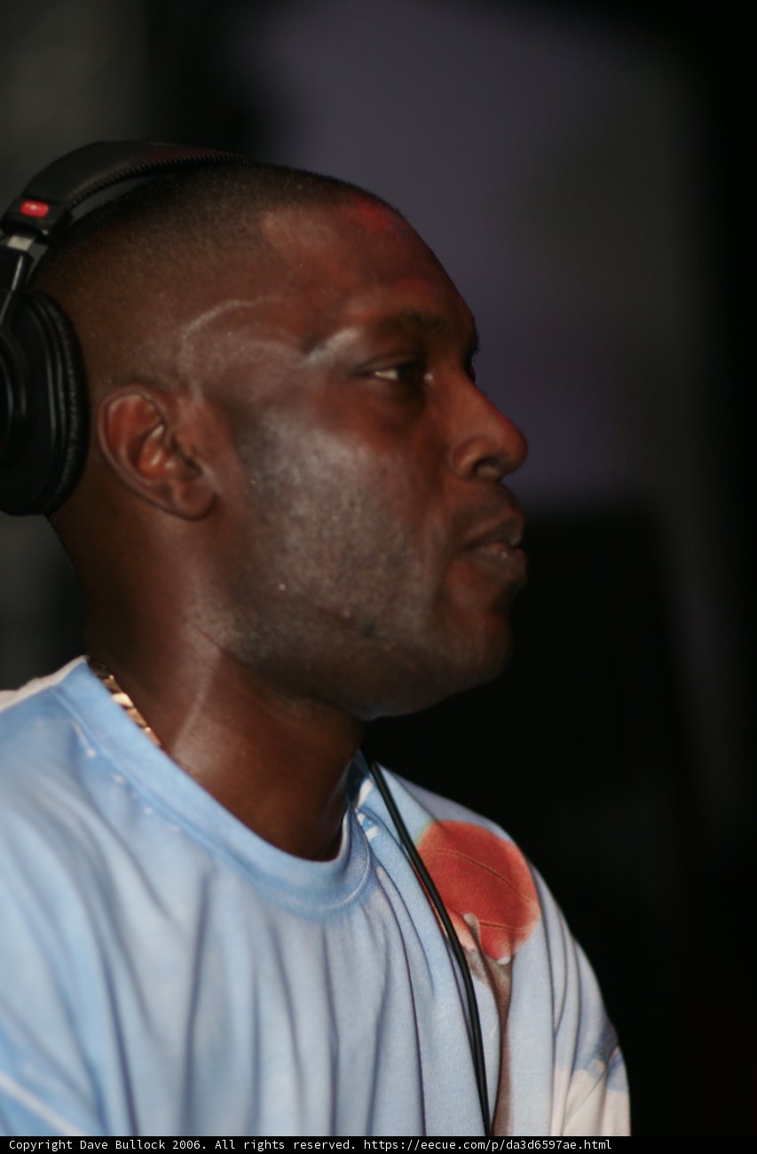 Blue Shirted Man Rocks the Microphone